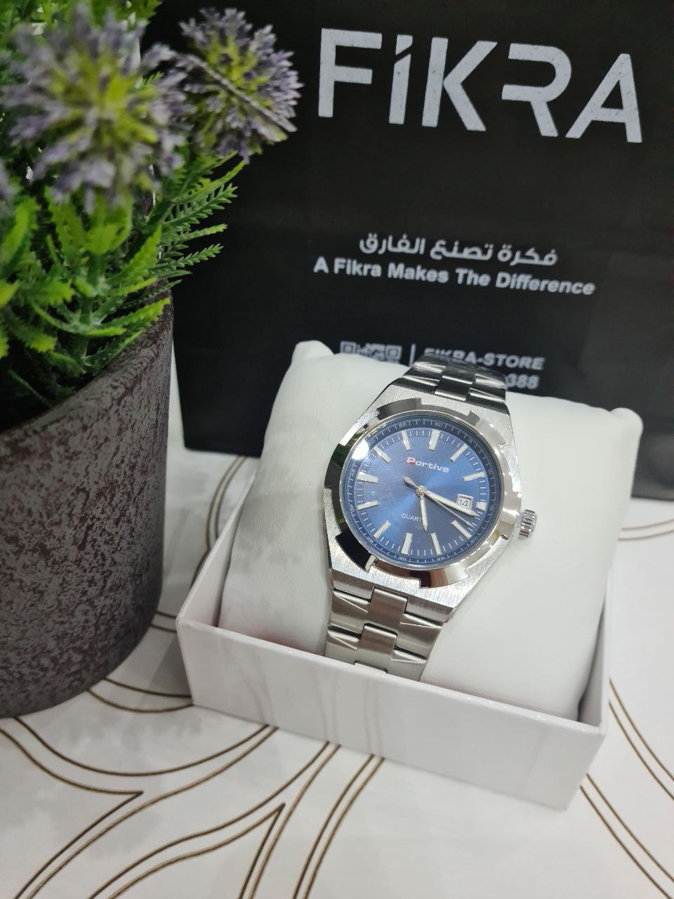 ساعة تيتان ايدج