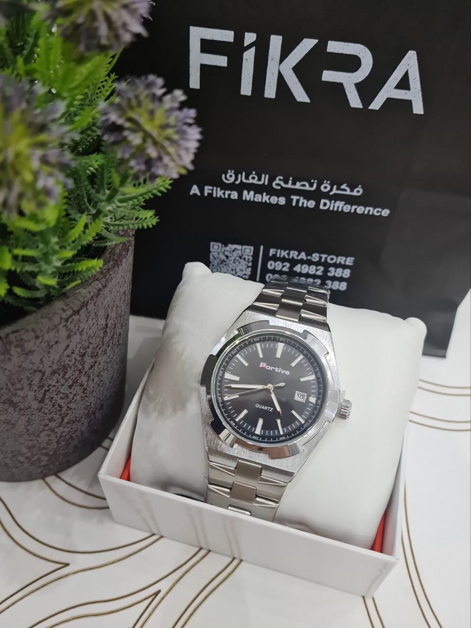 ساعة تيتان ايدج
